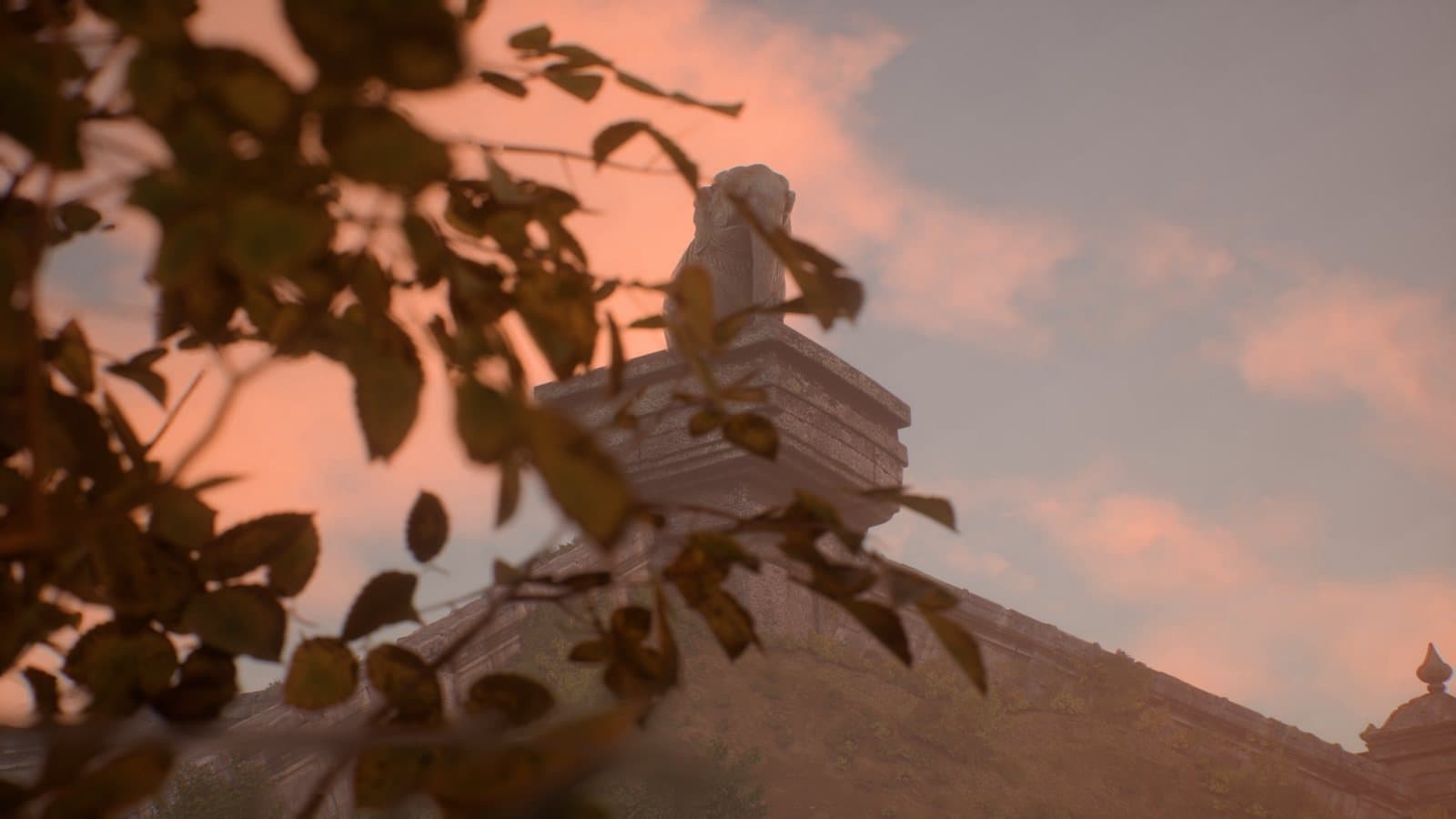 A carved stone animal on a plinth seen through dhok branches at dusk
